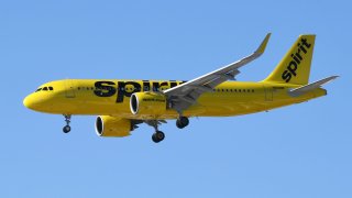 A Spirit Airlines jet comes in for a landing