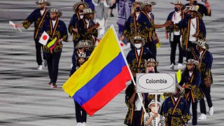 Representantes de la delegación de Colombia fueron registrados este viernes, durante el desfile inaugural de los Juegos Olímpicos de Tokyo 2020, en el Estadio Olímpico de Tokyo.