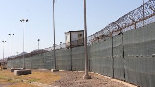 FILE - A guard tower is seen outside the fencing of Camp 5 at the US Military's Prison in Guantanamo Bay, Cuba on January 26, 2017.