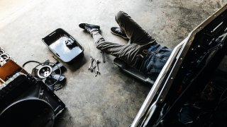 Man working under car