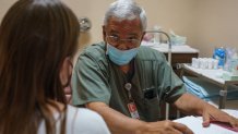 Dr. Franz Theard consults a woman seeking abortion from Oklahoma in his clinic, Womens Reproductive Clinic, a provider of abortions in Santa Teresa, New Mexico on May 7, 2022. Paul Ratje/The Washington Post via Getty Images