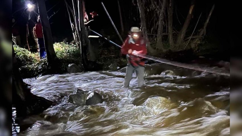 Five kids and three adults were rescued with a makeshift zipline in the Tujunga Canyons area of the Angeles Forest after a storm trapped them between two river crossings Sunday night.