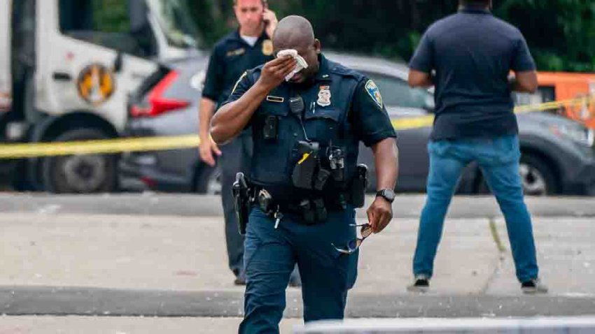 BALTIMORE, MARYLAND – JULY 2: Baltimore Police investigate the site of a mass shooting in the Brooklyn Homes neighborhood on July 2, 2023 in Baltimore, Maryland. At least two people were killed and 28 others were wounded  during the shooting at a block party on Saturday night. (Photo by Nathan Howard/Getty Images)