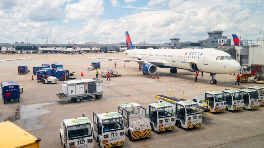 ATLANTA, GEORGIA – JULY 23: A delayed Delta Airlines plane sits on the tarmac at the Hartsfield-Jackson Atlanta International Airport on July 23, 2024 in Atlanta, Georgia. Delta Airlines has canceled and delayed hundreds of more flights as problems caused by last week’s Crowdstrike global technology outage continue into a fifth day.  (Photo by Brandon Bell/Getty Images)