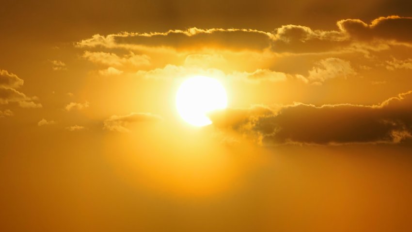 A superb image of the sunlight and the clouds, both floating in the morning sky.