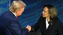 US Vice President and Democratic presidential candidate Kamala Harris (R) shakes hands with former US President and Republican presidential candidate Donald Trump during a presidential debate at the National Constitution Center in Philadelphia, Pennsylvania, on September 10, 2024. (Photo by SAUL LOEB / AFP) (Photo by SAUL LOEB/AFP via Getty Images)