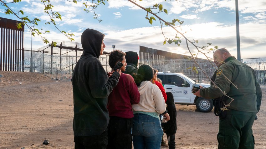 EL PASO, TEXAS – APRIL 02: A group of migrants wait to be processed after crossing the Rio Grande river on April 02, 2024 in El Paso, Texas. Last week, hundreds of migrants seeking asylum clashed with Texas national guardsmen while waiting to turn themselves in to border patrol agents for processing. Texas continues awaiting a verdict on Senate Bill 4. Attorneys representing the state of Texas are scheduled to return to the Fifth Circuit Court of Appeals in New Orleans on April 3 to continue arguing for the constitutional basis of the bill. Senate Bill 4 allows state law enforcement officials to detain and arrest undocumented immigrants suspected of illegally crossing into the United States. Thus far, all prior attempts to put the Bill into effect have been blocked by the Fifth Circuit Court of Appeals. (Photo by Brandon Bell/Getty Images)