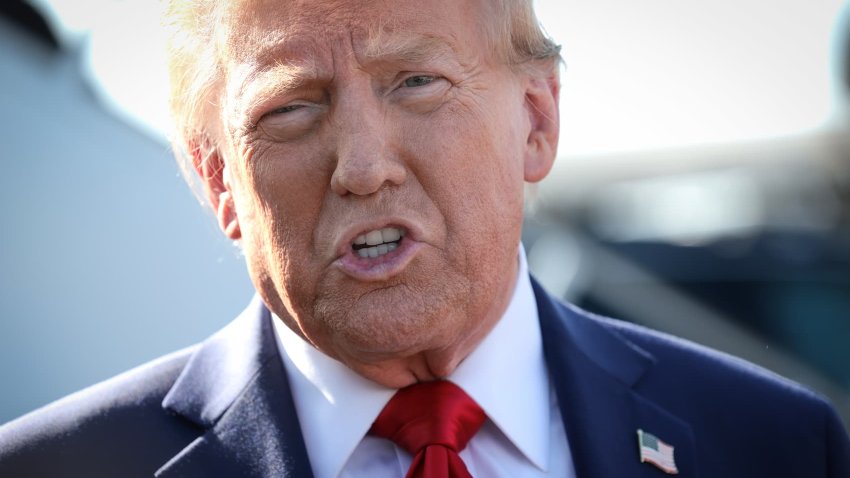 Republican presidential nominee, former U.S. President Donald Trump, addresses the media as he arrives at Detroit Metropolitan Wayne County Airport on October 18, 2024, in Detroit, Michigan. 