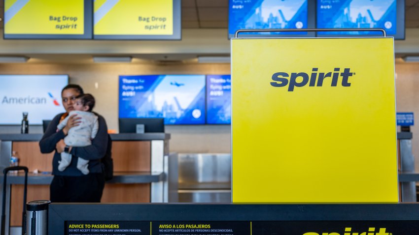 AUSTIN, TEXAS – NOVEMBER 13: A passenger waits for assistance at the Spirit Airlines check-in counter in the Austin-Bergstrom International Airport on November 13, 2024 in Austin, Texas. Spirit Airlines is preparing to file for Chapter 11 bankruptcy after a potential merger with Frontier Airlines failed, and the company continues grappling with significant financial woes. (Photo by Brandon Bell/Getty Images)