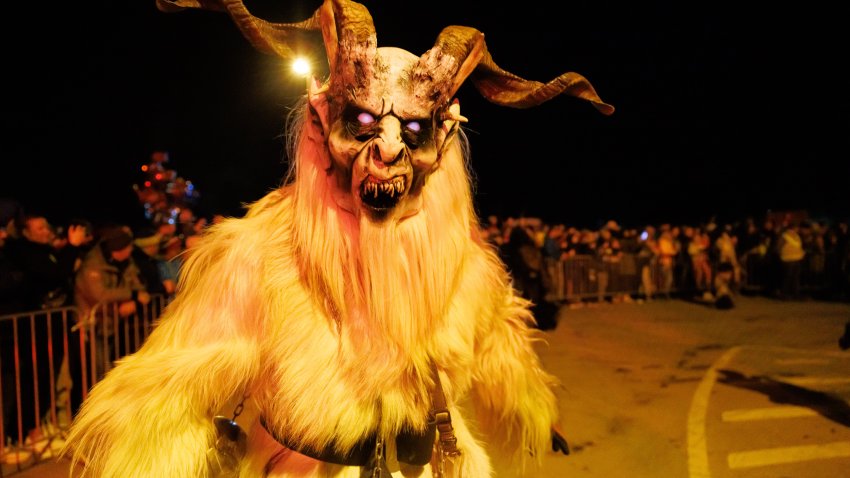 GORICANE, SLOVENIA – 2023/11/18: A Krampus poses for a photo during a Krampus run. More than 600 Krampuses from Slovenia, Austria, Italy, and Croatia joined the tenth anniversary of the Krampus run in Goriane. Krampus, a horned demon-like figure, traditionally works alongside Saint Nicholas or Santa Claus. While Santa rewards good children with gifts, Krampus scares and gives birch rods to misbehaving children. The Krampus run aims to remind both children and adults who haven’t been well-behaved to improve their behavior before Christmas. (Photo by Luka Dakskobler/SOPA Images/LightRocket via Getty Images)