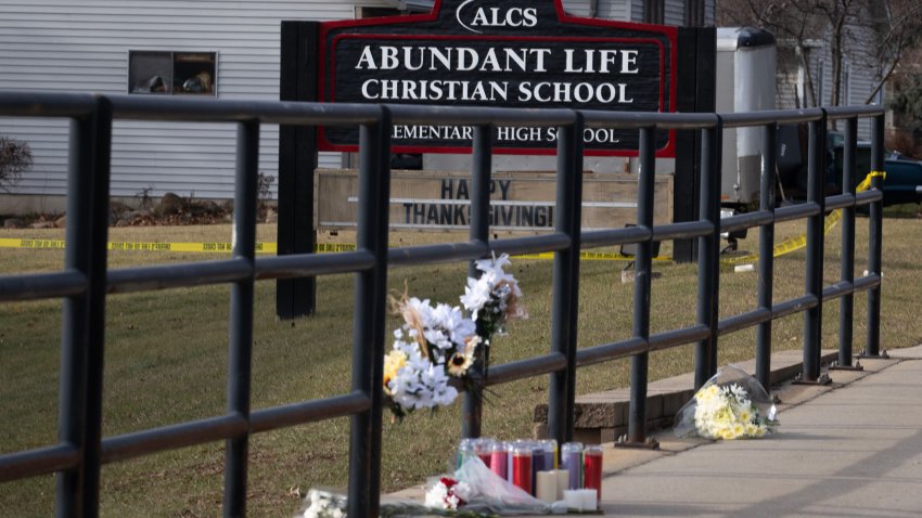 MADISON, WISCONSIN – DECEMBER 17: A makeshift memorial sits in front of Abundant Life Christian School as police continue to investigate yesterday’s shooting on December 17, 2024 in Madison, Wisconsin. Multiple people were reported shot and at least three have died after a student opened fire in the school. (Photo by Scott Olson/Getty Images)