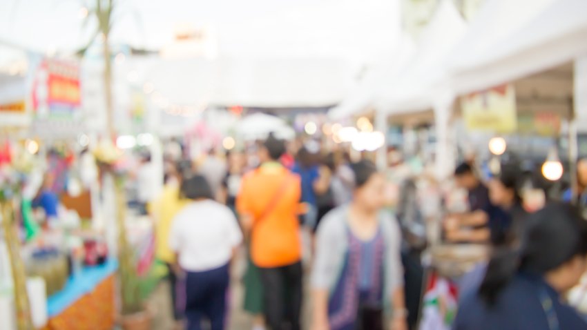 blurred crowded of people at walking street