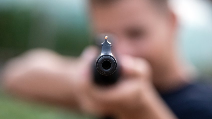 At gun point