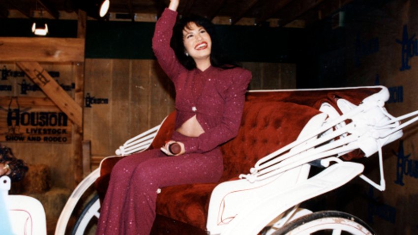 American singer Selena (born Selena Quintanilla-Perez, 1971 – 1995) rides in a carriage during a performance at the Houston Livestock Show & Rodeo at the Houston Astrodome, Houston, Texas, February 26, 1995. The performance was her last before her murder the following month. (Photo by Arlene Richie/Getty Images)