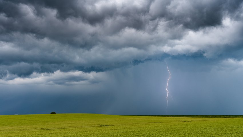 a magnificent cloud of lightning seen by chance on a broad meadow.